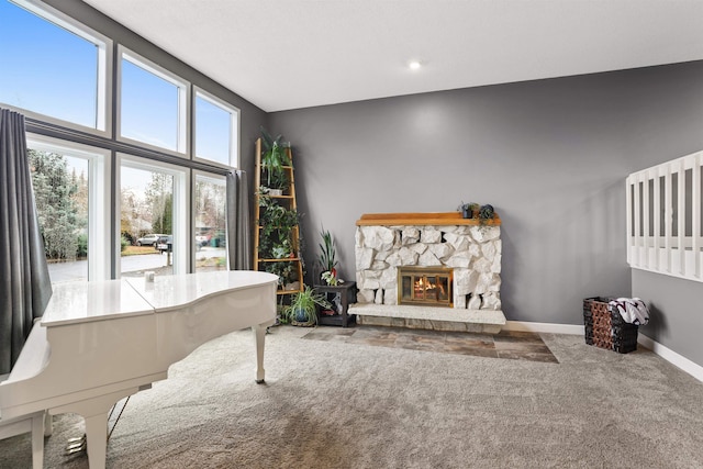 interior space with a stone fireplace