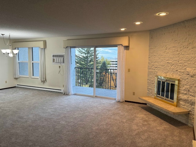 unfurnished living room featuring a wall unit AC, baseboard heating, a textured ceiling, carpet, and a stone fireplace