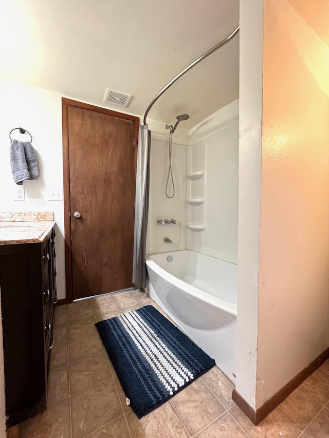 bathroom with shower / bath combination with curtain, vanity, and tile patterned flooring