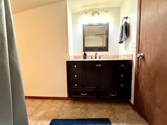 bathroom with vanity and tile patterned floors