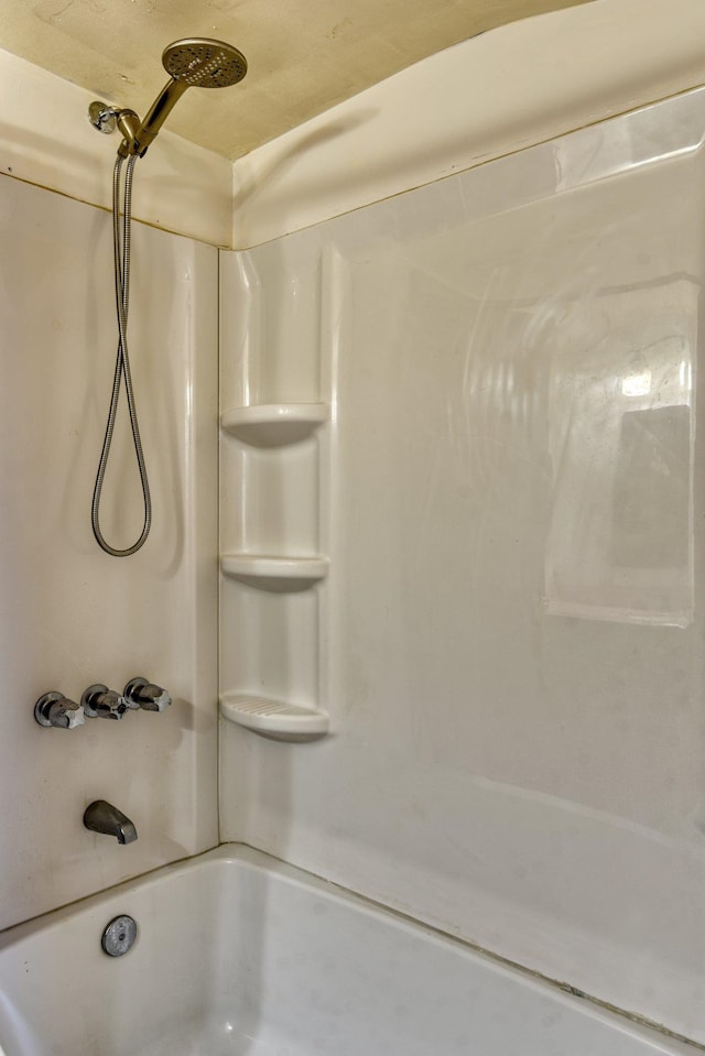 bathroom with shower / tub combination