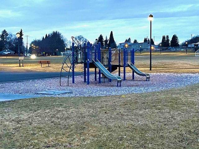 view of jungle gym with a yard