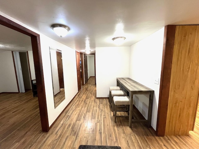 hallway featuring hardwood / wood-style flooring