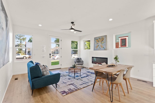 interior space with light wood-type flooring and ceiling fan