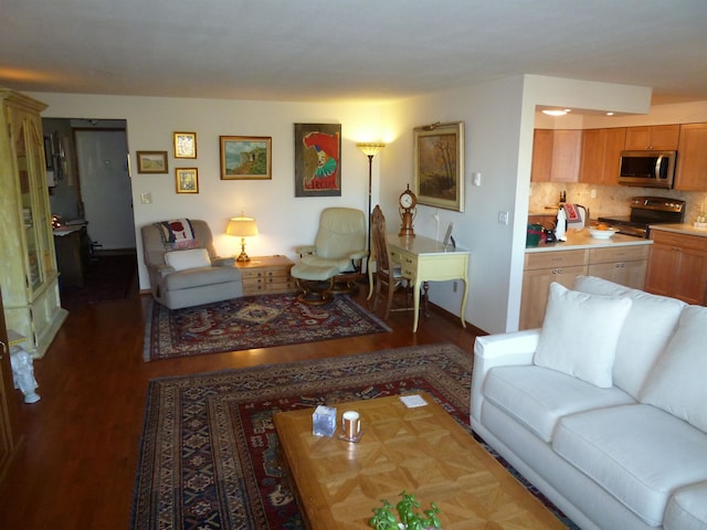 living room featuring dark wood-type flooring