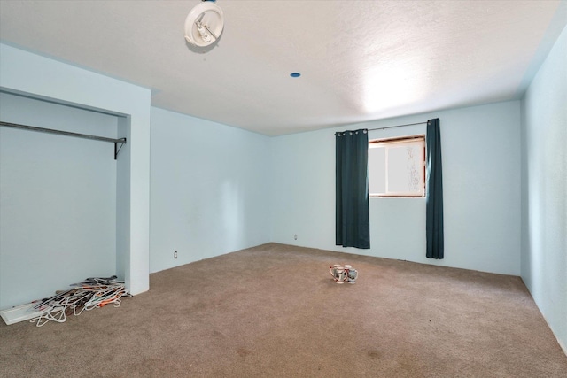 unfurnished bedroom with carpet floors