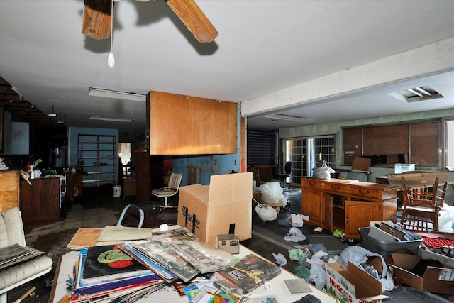 interior space featuring ceiling fan