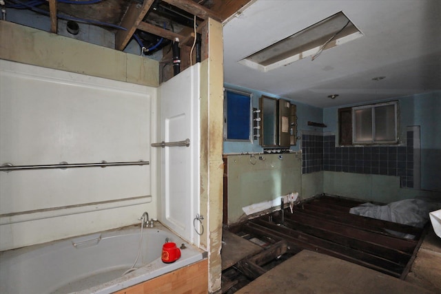 bathroom featuring a bath