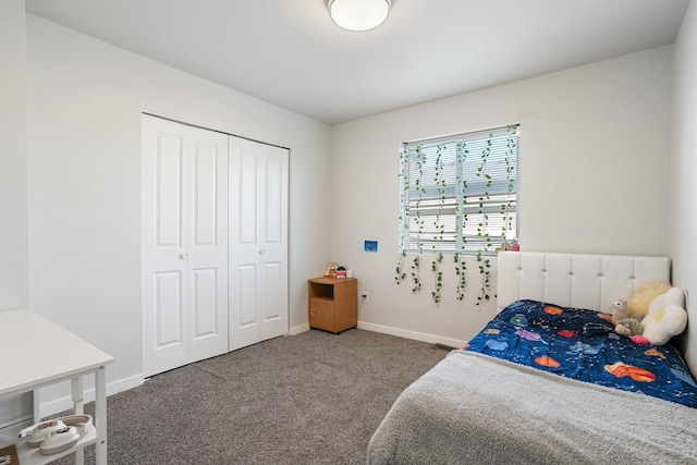 carpeted bedroom with a closet