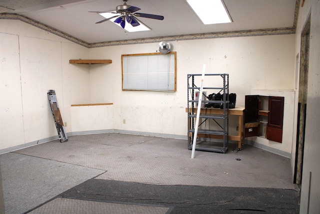 interior space with ceiling fan