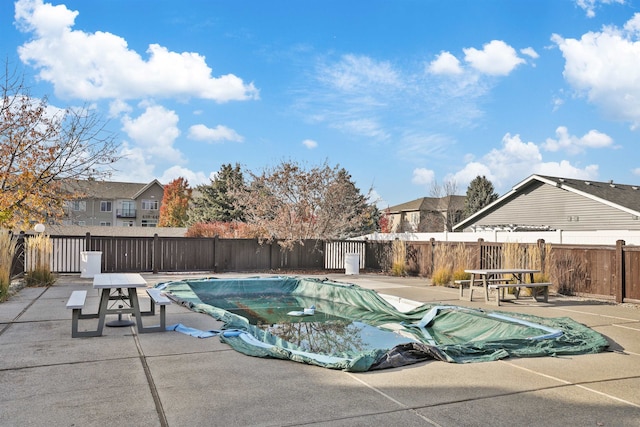 view of pool featuring a patio