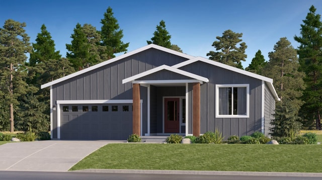 view of front of house with a garage and a front yard