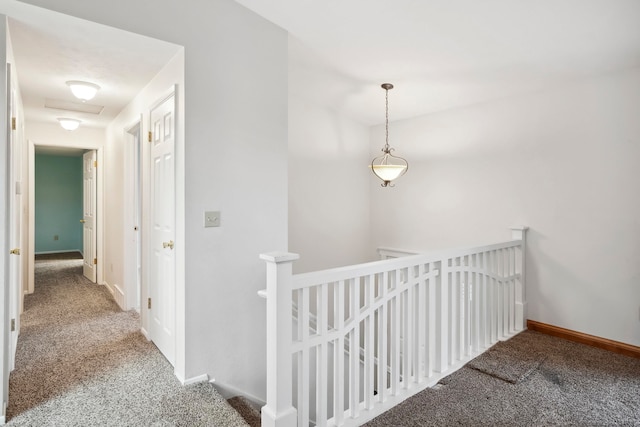 hall with carpet floors