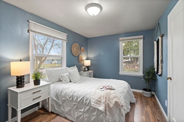 bedroom featuring dark wood-type flooring