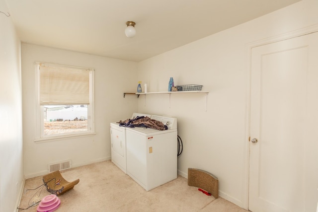 bedroom with ceiling fan and light carpet