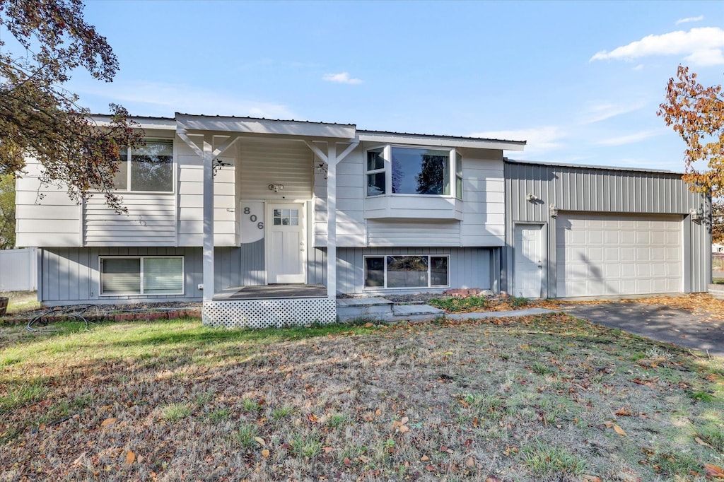 split foyer home featuring a garage