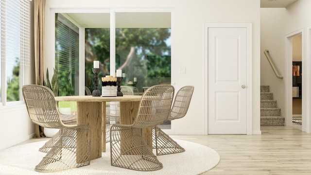 dining room with hardwood / wood-style floors