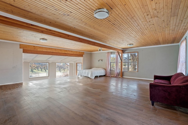 unfurnished bedroom featuring wood-type flooring, beam ceiling, multiple windows, and wood ceiling