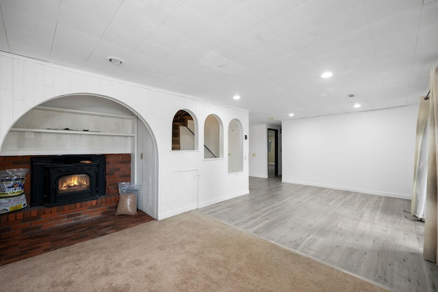 unfurnished living room with hardwood / wood-style floors