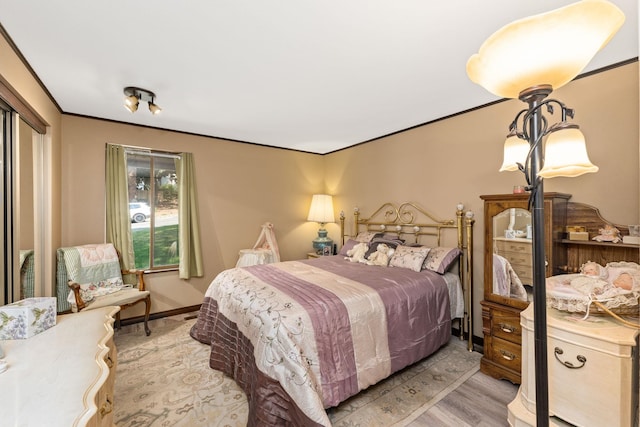 bedroom featuring light hardwood / wood-style floors