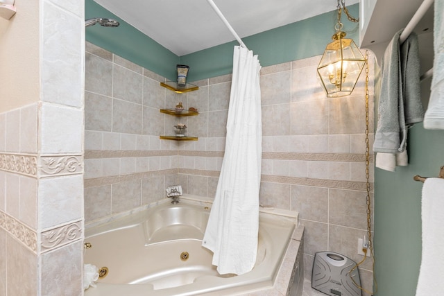 bathroom with tile walls and shower / tub combo