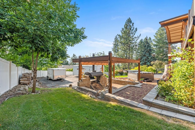 view of yard with a pergola and a patio area