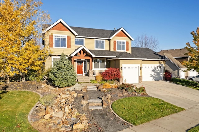 craftsman-style house featuring a porch and a garage