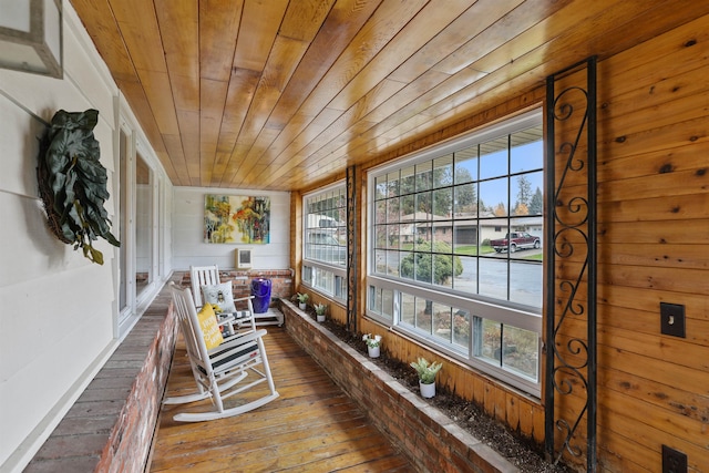 sunroom / solarium with wood ceiling