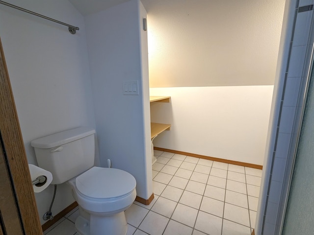 bathroom with tile patterned floors and toilet