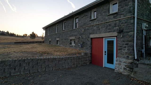 view of property exterior at dusk