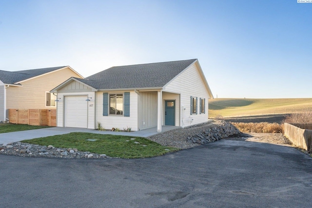 single story home with a garage