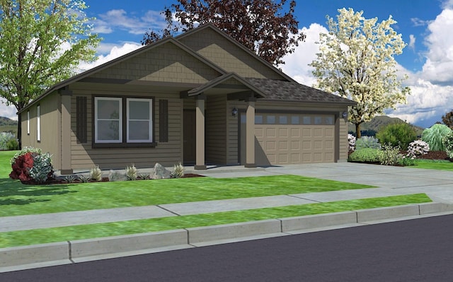 view of front of house featuring a front yard and a garage