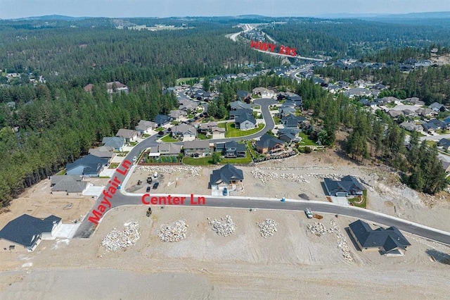58 E Center Ln, Spokane, WA 99208 - aerial view of property and surrounding area featuring a heavily wooded area and nearby suburban area