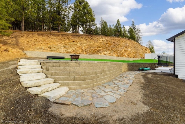 exterior space featuring a trampoline