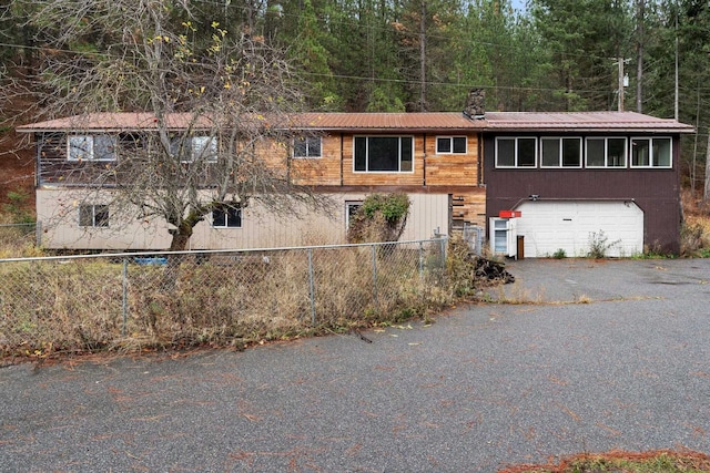 view of front of house with a garage