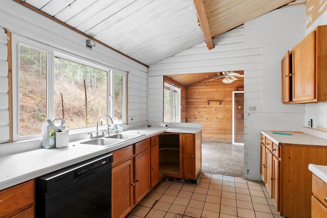 kitchen with lofted ceiling with beams, black dishwasher, a healthy amount of sunlight, and sink