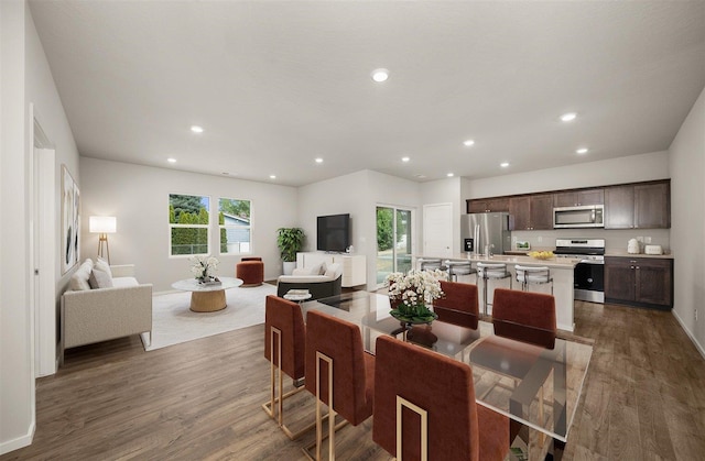 dining area featuring dark hardwood / wood-style floors