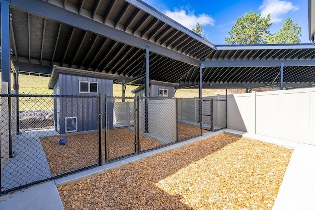 view of patio / terrace featuring an outbuilding