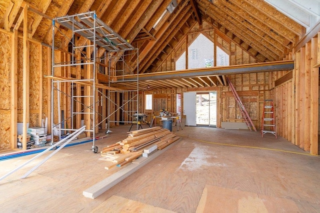 misc room with high vaulted ceiling