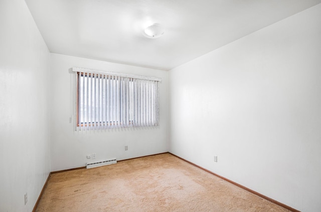 unfurnished room featuring carpet