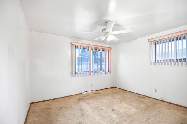 carpeted empty room with ceiling fan