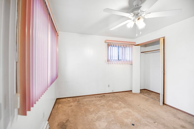 unfurnished bedroom featuring ceiling fan and light carpet