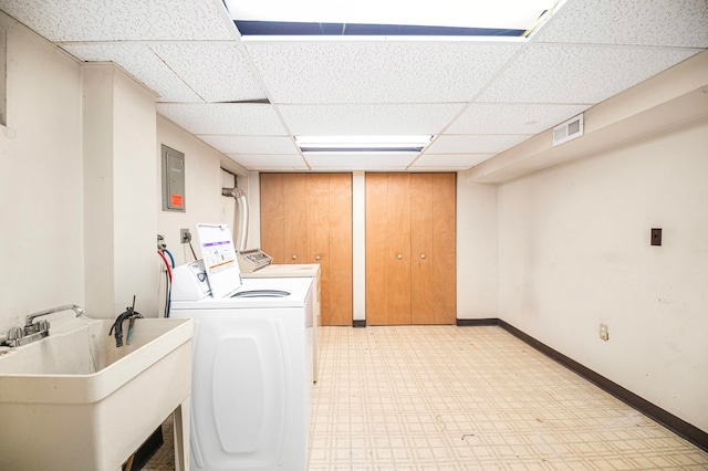 laundry room with sink and independent washer and dryer