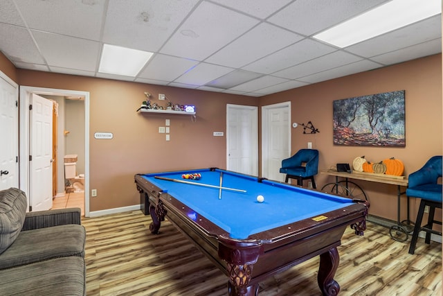 rec room with hardwood / wood-style floors, a paneled ceiling, and pool table