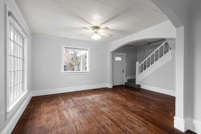 unfurnished living room with crown molding, ceiling fan, and hardwood / wood-style flooring