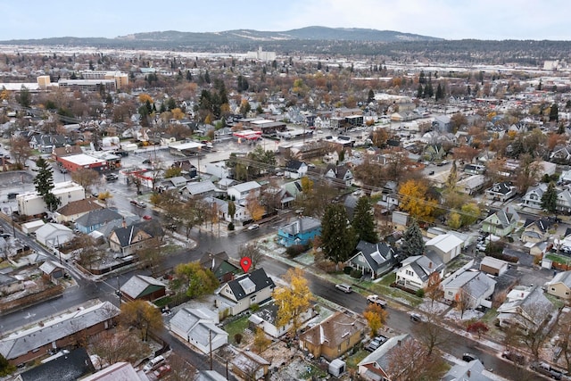 drone / aerial view featuring a mountain view