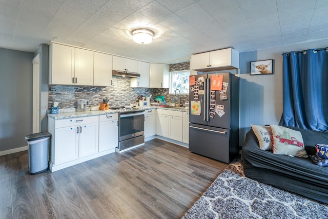 kitchen with white cabinetry, dark hardwood / wood-style flooring, sink, and appliances with stainless steel finishes