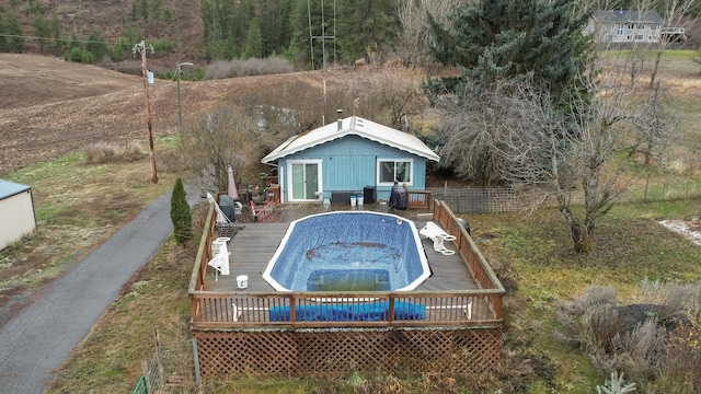 view of pool featuring a deck