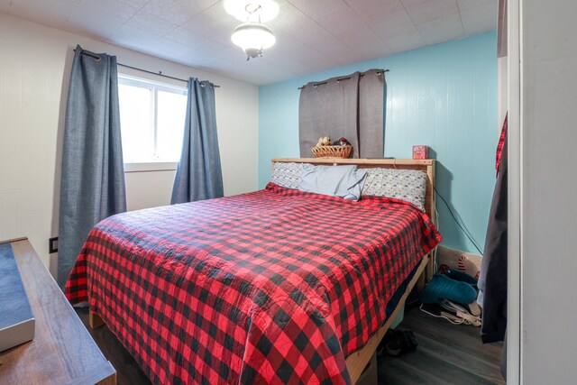 bedroom with wood-type flooring