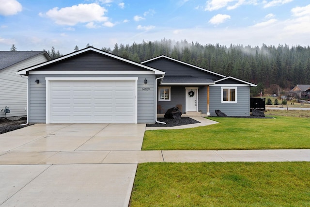 single story home featuring a garage and a front lawn